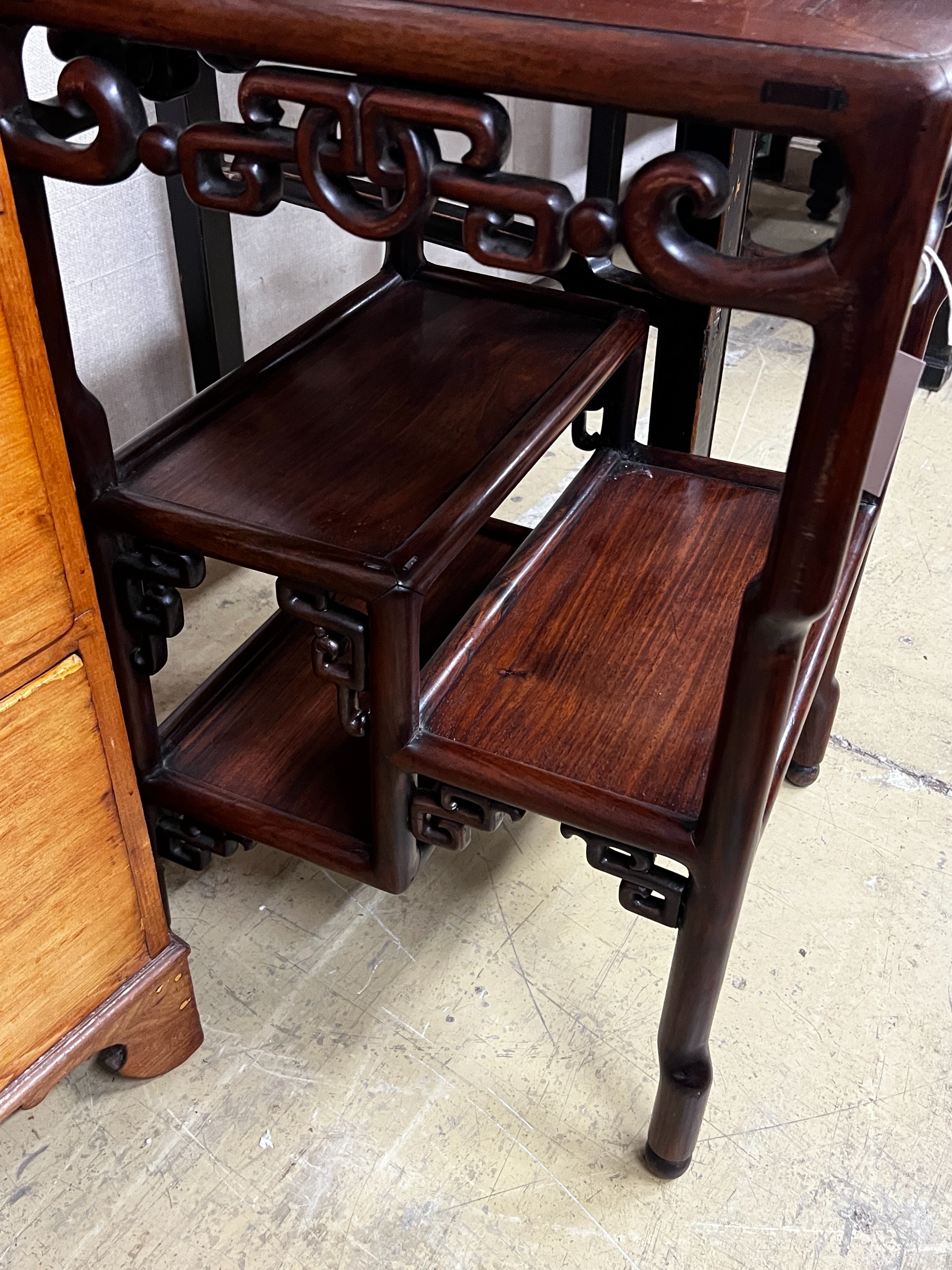 A Chinese carved hongmu two tier table, width 45cm, depth 45cm, height 73cm